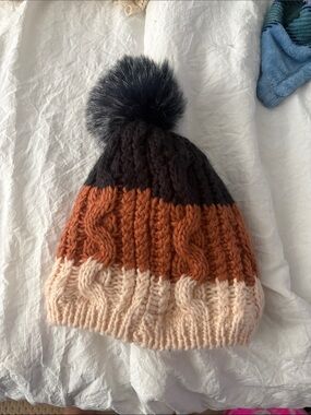Cozy Colorblock Cable-Knit Pom Beanie in Black, Rust & Cream